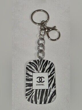 CHANEL Black and White Zebra Logo Keyring with Silver Hardware